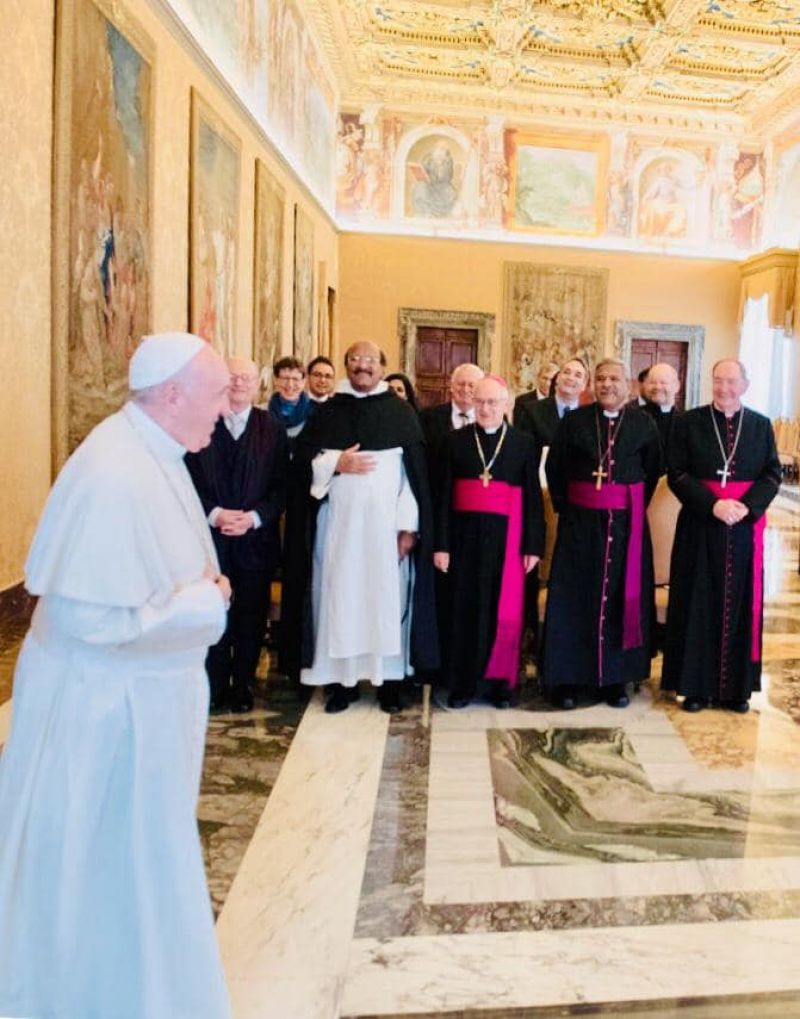 Pope Francis entering the meeting hall